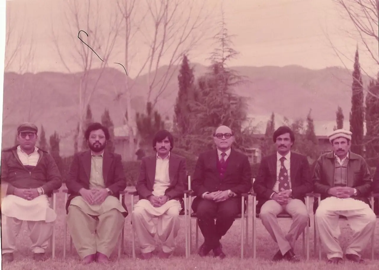 Historical group photograph of Dr Noor Islam, Prof. Dr A. J. Khan and their colleagues seated together